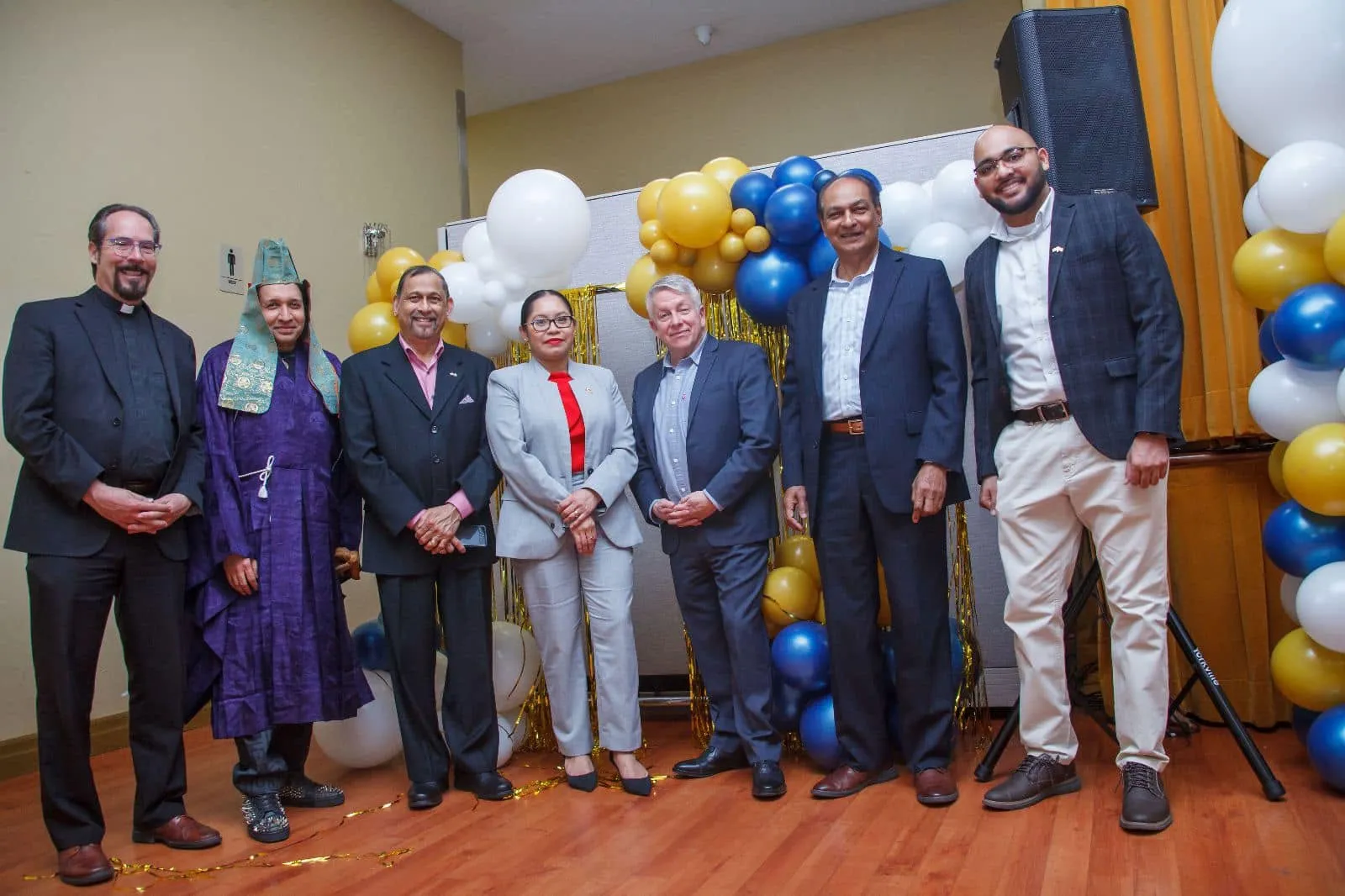 Faith leaders of different traditions standing together at the Ramadan Interfaith Gala